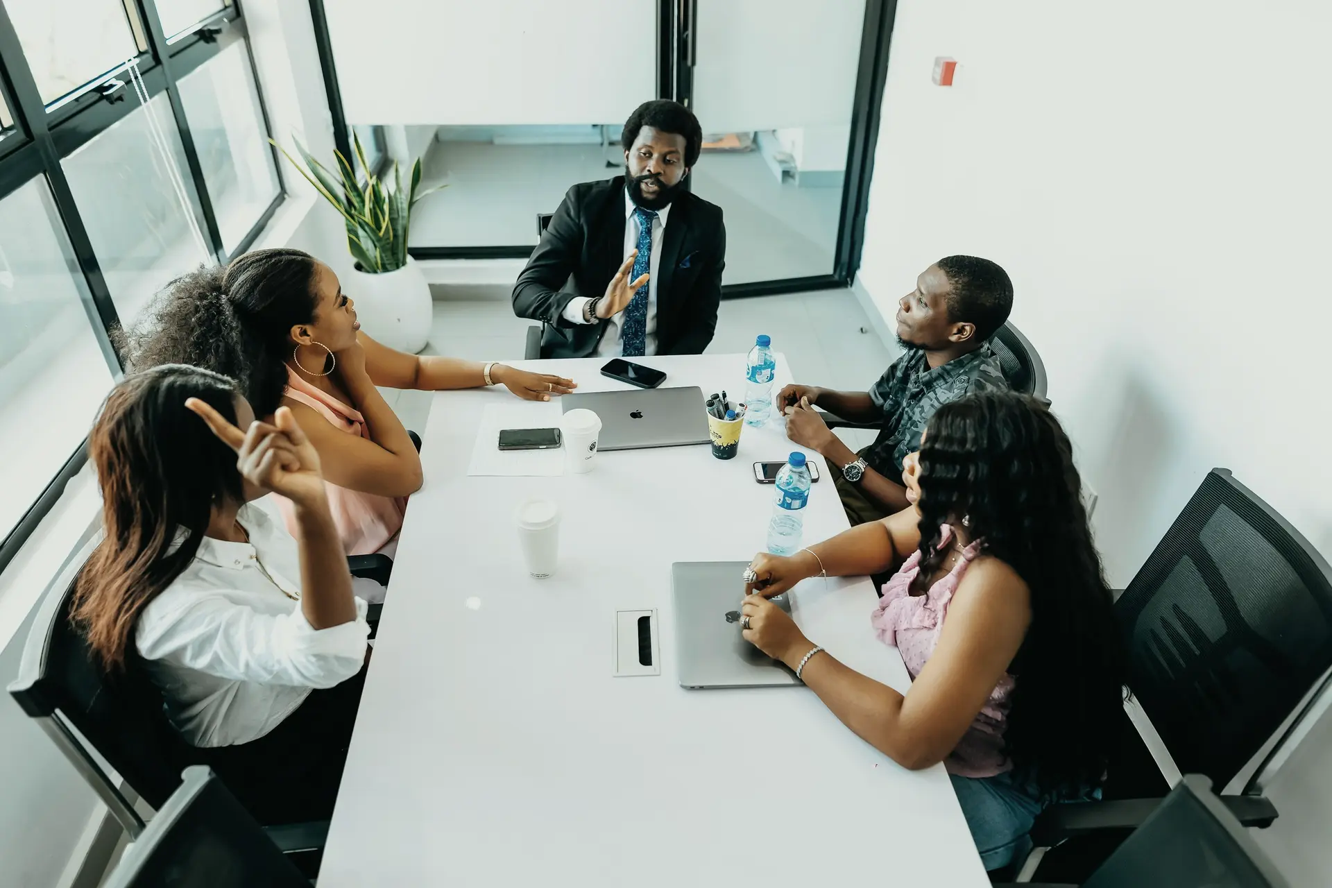 A business team meeting around a table